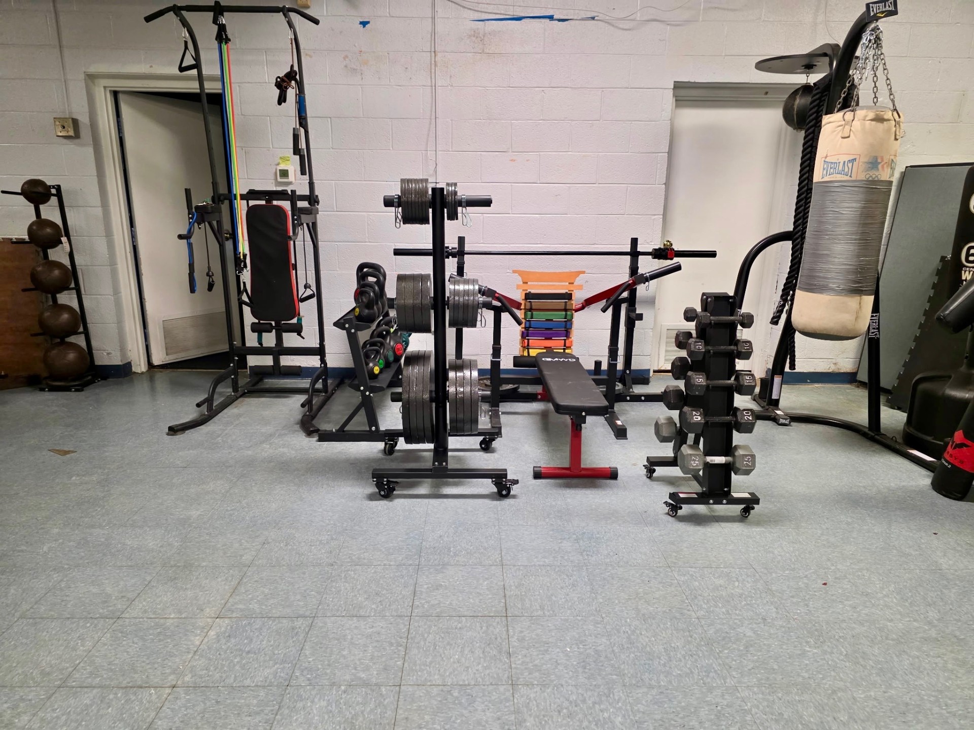 Strength room with weights and bench
