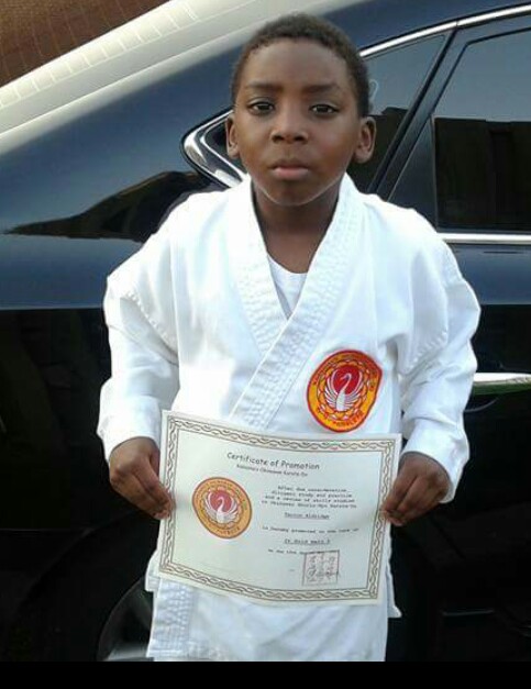 Student with certificate